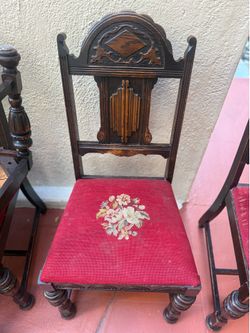 Embroidered vintage carved wood dining chairs