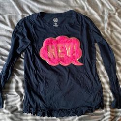 Navy long sleeve, pink furry “Hey!” Text bubble