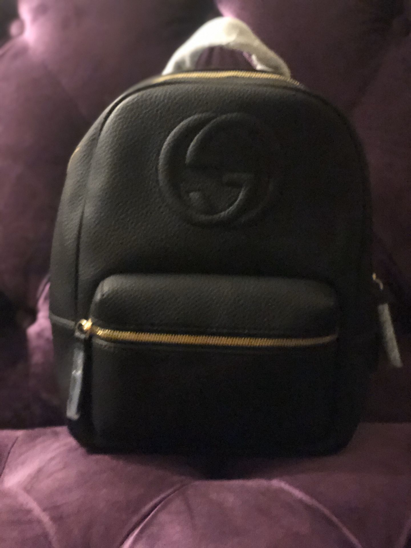 Medium size black leather backpack