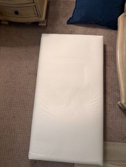 Dual sided crib mattress