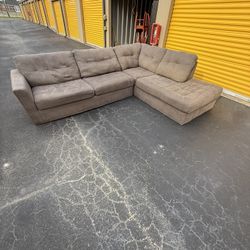 Dark grey 2 pc sectional set. $300. Will deliver for a fee