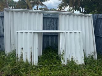 Accordion hurricane shutters aluminum