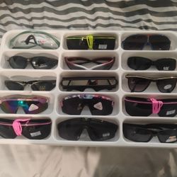 15 Sunglasses And A Tray For 20 Bucks