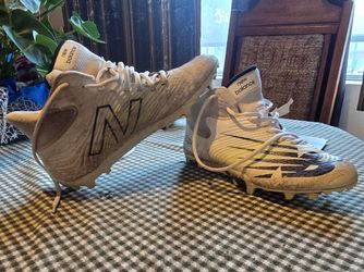 New Balance Rush V3 mid-top cleats