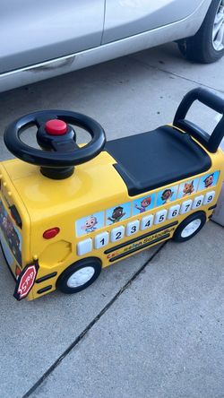 Coco Melon ride-on school bus