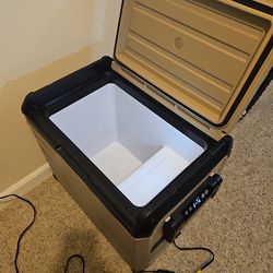 Eenour portable car refrigerator.