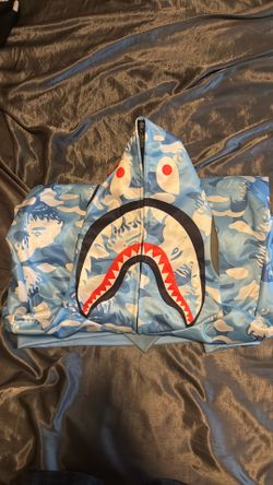blue bape jacket small but runs big