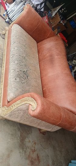 Ornate Victorian-Style Sofa with Carved Wood Trim