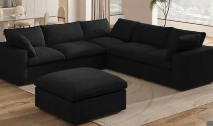 Black sectional w/ storage ottoman