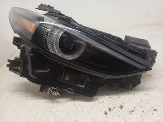Mazda 3 passenger side headlight assembly