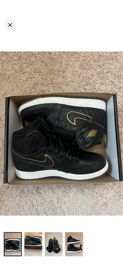 Nike Black High-Top Sneakers with Gold Trim