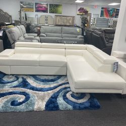 Beautiful Sleeper Sectional With Adjustable Headrest And Storage In Stock In Black And White 
