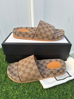 Beige Gucci slides