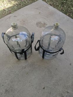 Carboy glass 6.5 gallon with carry strap $45 a piece