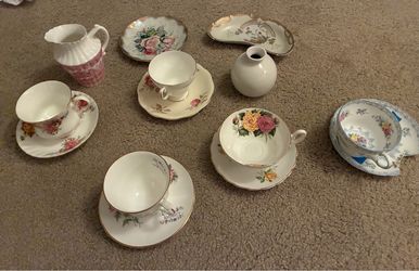 Vintage tea cups and vintage pitcher and small vase