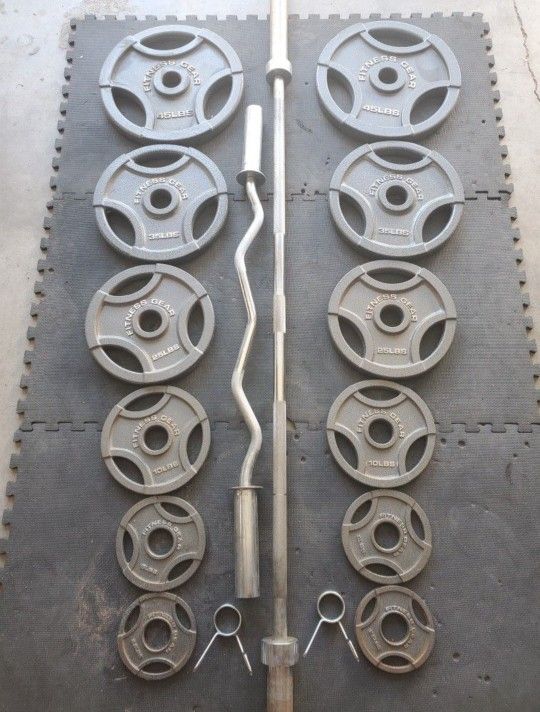 ..Complete Olympic Weight Set With Olympic Bar & Curl bar ..295lbs all together read Description below