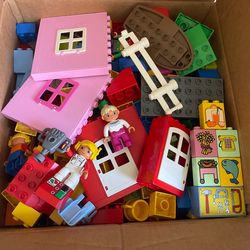 Large box of Lego Duplo blocks and minifigures