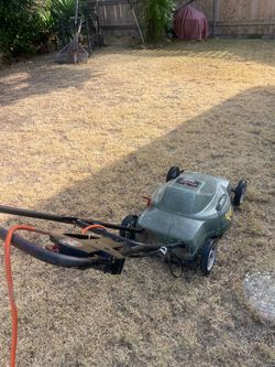 Electric lawnmower $35 add 50 ft extension cord $10