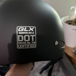 Two motorcycle helmets.