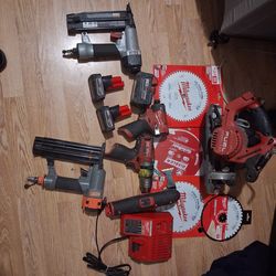 Lot of Milwaukee tools and items with nail guns