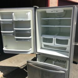 General Electric brand refrigerator measures 30 in width and 68 in height 3