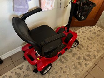 Red Electric Mobility Scooter with Basket