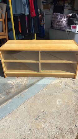 Blonde wood cabinet