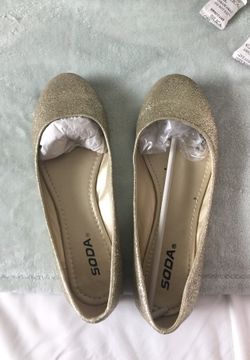 Gold flat shoes
