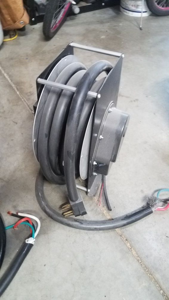 Rv 50 amp powered cord reel and 50 amp cord for Sale in Frederick, CO