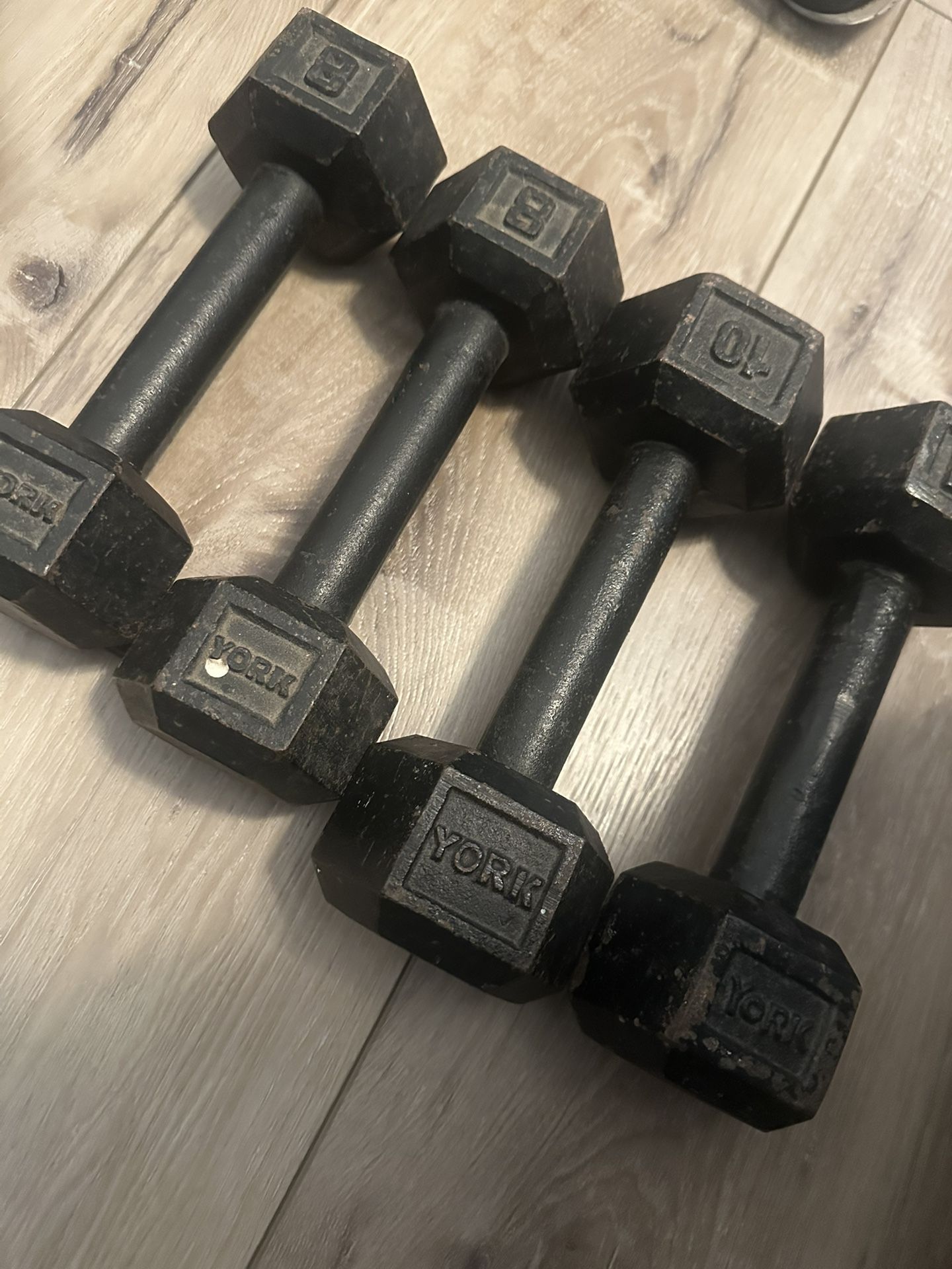 2 Sets Of Metal dumbbells (8 and 10 Pounds)