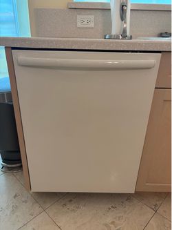 Slide in Bisque stove, dishwasher , microwave