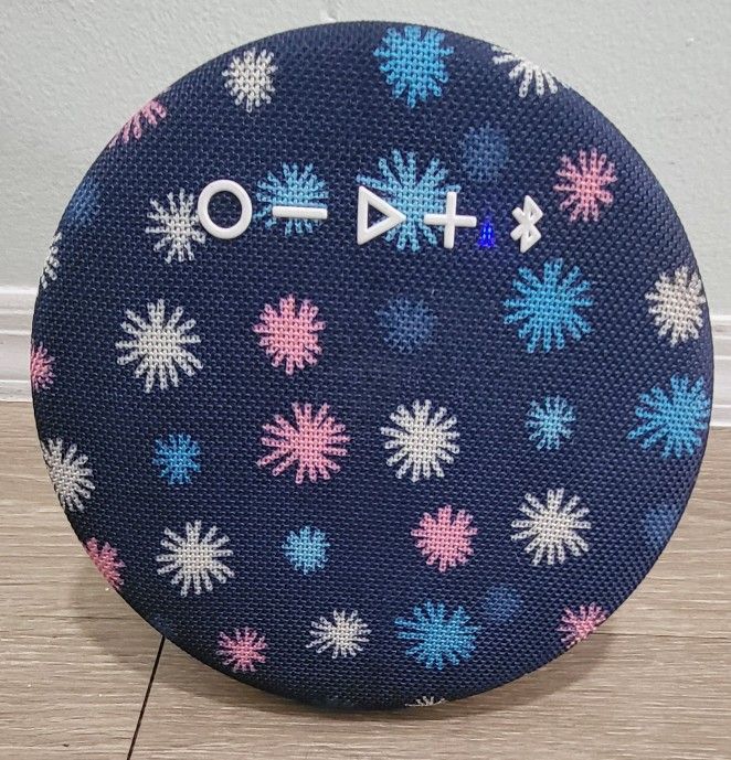 ONN. PORTABLE BLUETOOTH SPEAKER IPX4 WATER RESISTANT, ROUND WIRELESS, SPEAKER, NAVI SPARK