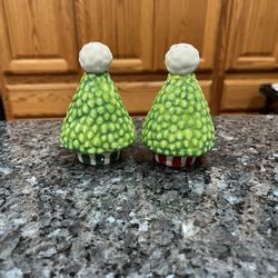  Hand Painted Ceramic Christmas Tree Pair of Salt and Pepper Shakers.  Size approximately 3 1/2 inches.  Preowned.  Has been on display in a cabinet w