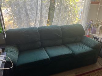 Dark blue-green couch