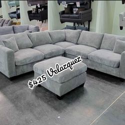 4 pc fog grey cordury fabric upholstered sectional sofa with ottoman. This set includes the LAF / RAF love seat, corner wedge and ottoman. Sectional m