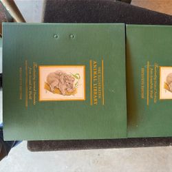 two Binders With Animals From Around The World