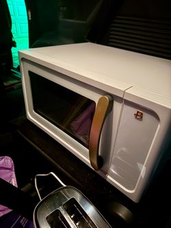 Matching Drew Barrymore Microwave and Toaster in white icing with golden accents - Like New - used less than 1 year - for pick up in La Puente - price