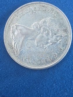 1957 & 1965 Canadian Silver Half Dollars – $35 Each