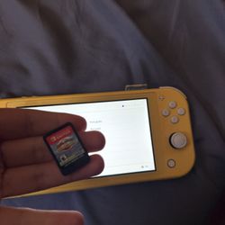 Nintendo Switch Lite And A Game 