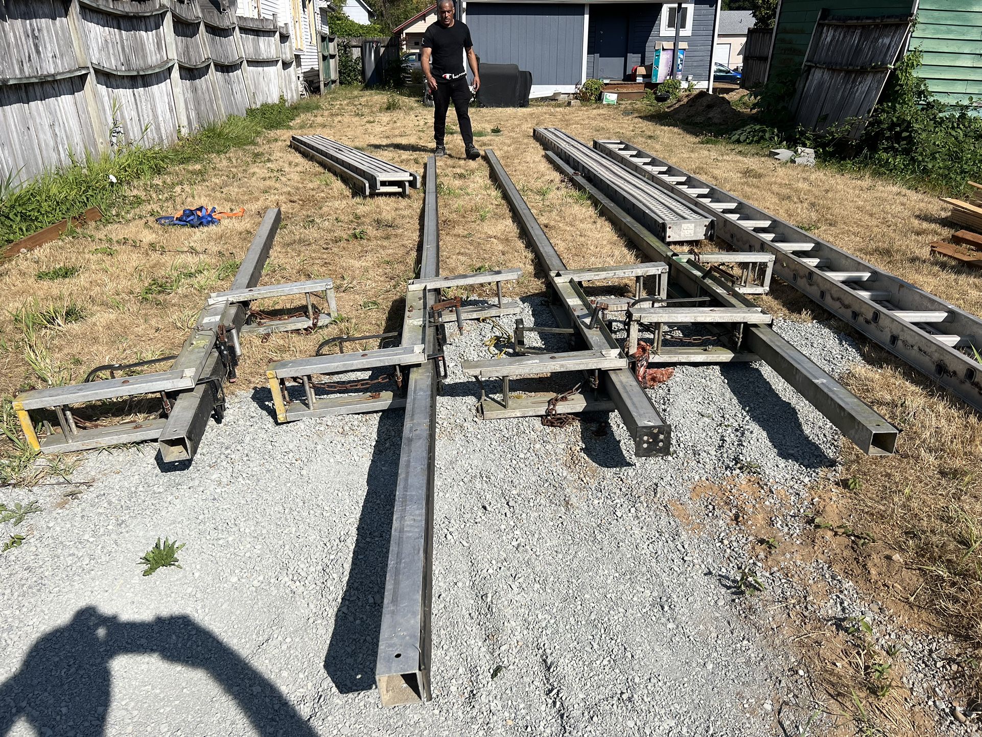 Two 25’ Siding Jacks And One 13’ Siding Jack Wi Two 24’ Planks for Sale