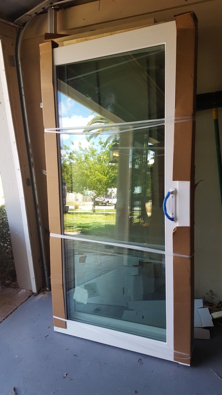 Brand new Jeld Wen Impact Premium vinyl (V-4500) 12 ft (142"W X 80"H) patio doors