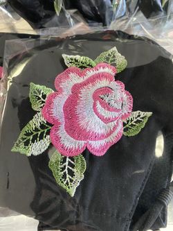 Mask with flower embroidered