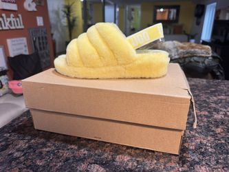 UGG Women's Yellow Slippers