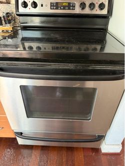 Spectra Electric Freestanding Range and Oven Black and Stainless Steel