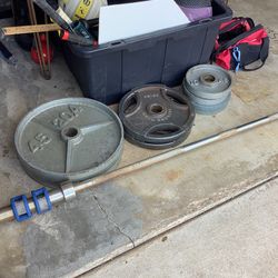 200 Lbs of Olympic Weight and Bar