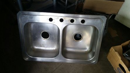 Sink which is 22 inches by 32 inches