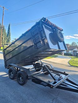 NEW DUMP TRAILER 12X8X4 12000 LBS
ROLLING TARP--SPARE TIRE,ELECTRIC BRAKES,HYDRAULIC SYSTEM,REMOTE CONTROL,IDEAL FOR HAULING, DEMOLITION, TRASH ETC,