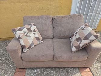 Sofa and love seat set with pillows