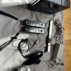 ** Black Nintendo Wii With 2 Remotes And 1 Game For Sale **
