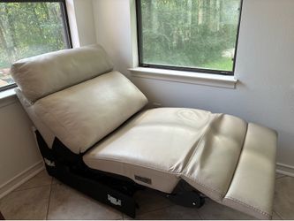 Real leather powered armless recliner almost new
